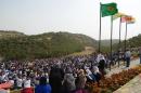 People attending the funeral ceremony of Mehdi Taskin, who died during clashes between protesters and security forces during an operation to remove a statue of Mahsum Korkmazare, one of the founders of the PKK, on August 19, 2014