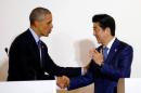 U.S. President Barack Obama shakes hands with Japan's Prime Minister Shinzo Abe during a press conference after a bilateral meeting during the 2016 Ise-Shima G7 Summit in Shima, Japan