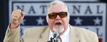 In this July 23, 2011 file photo, veteran Philadelphia sportswriter Bill Conlin speaks after receiving the J.G. Taylor Spink Award during a ceremony at Doubleday Field in Cooperstown, N.Y. (AP Photo/Mike Groll)