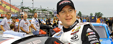 Kurt Busch gets out of his car after winning the pole for the NASCAR Nationwide Series auto race at Watkins Glen International in Watkins Glen, N.Y., Saturday, Aug. 13, 2011. (AP Photo/Russ Hamilton Sr.)
