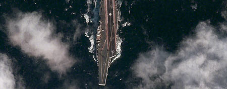 This Dec. 8, 2011 satellite image provided by the the DigitalGlobe Analysis Center shows the Chinese aircraft carrier Varyag sailing in the Yellow Sea, approximately 100 kilometers south-southeast of the port of Dalian, China. (AP Photo/DigitalGlobe)