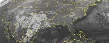 This NOAA satellite image taken Monday, Dec. 19, 2011 at 12:45 a.m. EST shows cloud cover over the Southwest. (AP PHOTO/WEATHER UNDERGROUND)