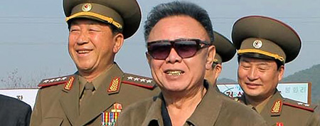 In this undated photo released by the Korean Central News Agency in North Korea and distributed by Korea News Service in Tokyo on Monday, June 7, 2010, North Korean leader Kim Jong Il smiles as he visits Taedonggang Combined Fruit Farm in Pyongyang, North Korea. (AP Photo/Korean Central News Agency via Korea News Service)