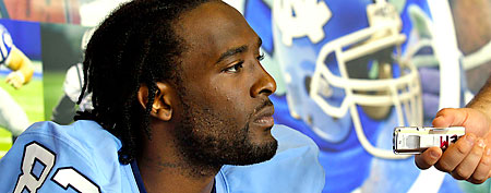 North Carolina wide receiver Dwight Jones answers question during an NCAA college football media day in Chapel Hill, N.C., Thursday, Aug. 11, 2011. (AP Photo/Gerry Broome)