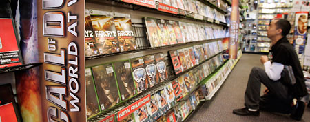 A Call of Duty game advertisement is shown at GameStop store in Redwood City, Calif., Wednesday, Dec. 17, 2008. (AP Photo/Paul Sakuma)