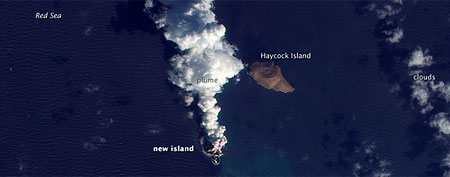 A plume rises from a new island in the Red Sea on Dec. 23, 2011 in this satellite view. (Photo by NASA Earth Observatory)