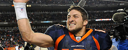 Denver Broncos quarterback Tim Tebow (15) celebrates after beating the Pittsburgh Steelers 29-23 in overtime of an NFL wild card playoff football game Sunday, Jan. 8, 2012, in Denver. (AP Photo/Chris Schneider)