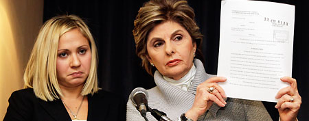 Attorney Gloria Allred holds a copy of a lawsuit filed in U.S. District Court on behalf of her client Alison Fournier, left (AP/Richard Drew)