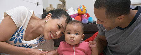 Baby and parents (Thinkstock)