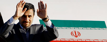 Iranian president Mahmoud Ahmadinejad waves from his airplane before departing to Ecuador at the Jose Marti international airport in Havana, Cuba, Thursday, Jan. 12, 2012. (AP Photo/Javier Galeano)