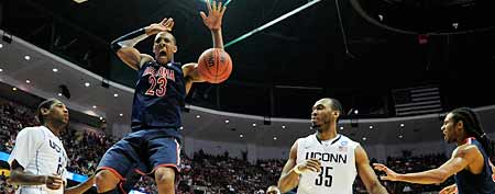 Arizona's Derrick Williams dunks during the second half of the NCAA West regional college basketball championship game, Saturday, March 26, 2011, in Anaheim, Calif. (AP Photo/Mark J. Terrill)
