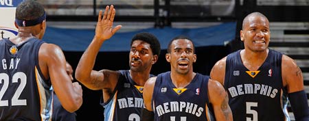 Rudy Gay #22, O.J. Mayo #32, Mike Conley #11 and Marreese Speights #5 of the Memphis Grizzlies celebrating during a timeout (Photo by Rocky Widner/NBAE via Getty Images)
