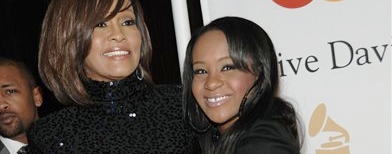 Whitney Houston dan Bobbi Kristina Brown (Dan Steinberg/AP)