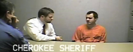In this Jan. 17, 2012 photo made from video and provided by the Cherokee (Ga.) Sheriff Department, convicted child killer Ryan Brunn is interviewed by authorities after his arrest near Kennesaw, Ga. (AP Photo/Cherokee (Ga.) Sheriff Department)