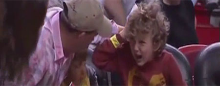 Child at Heat game. (Yahoo! Sports Minute)