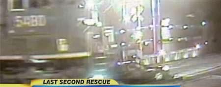 Surveillance footage of train smashing car (GMA)