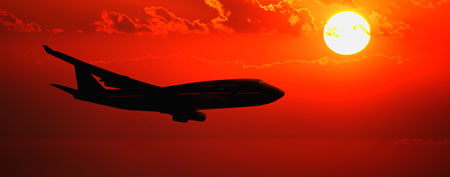 Plane at sunset (ThinkStock)
