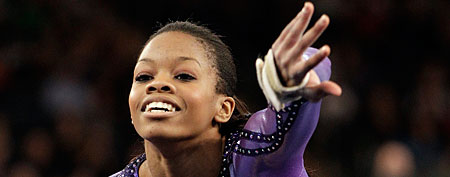 Gabrielle Douglas competes during the floor exercise portion of the American Cup gymnastics meet at Madison Square Garden in New York, Saturday, March 3, 2012. (AP Photo/Kathy Willens)
