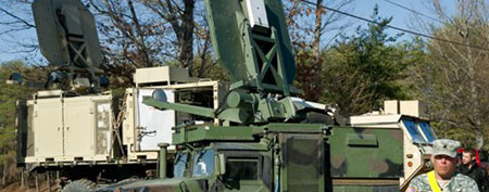 Two trucks carrying the Active Denial System (Paul J. Richards/AFP)