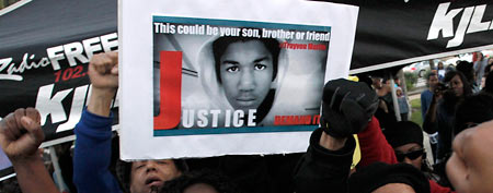Demonstrators gather to call for justice in the murder of Trayvon Martin at Leimert Park in Los Angeles, March 22, 2012. (Reuters/Jonathan Alcorn)