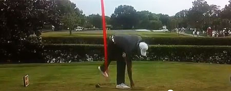 Tiger Woods picks up his club as TV analysts track his shot (Y! Sports screengrab)