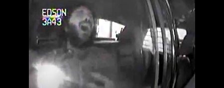 Video of suspect in police car. (Yahoo!)
