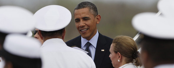 Secret Service agents sent home: President Barack Obama is greeted at the airport as he arrives to Cartagena, Colombia, Friday April 13, 2012. Obama is in Cartagena to attend the sixth Summit of the Americas. (AP Photo/Carolyn Kaster)