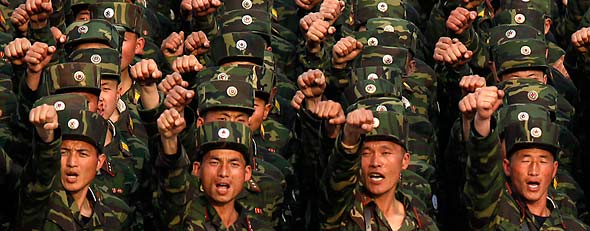 North Korea threatens to reduce S. Korea capital to ashes. File photo of North Korean soldiers chanting in central Pyongyang. (AP/Ng Han Guan)
