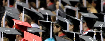 In this Saturday, Aug. 6, 2011 file picture, students attend graduation ceremonies at the University of Alabama in Tuscaloosa, Ala. (AP Photo/Butch Dill)