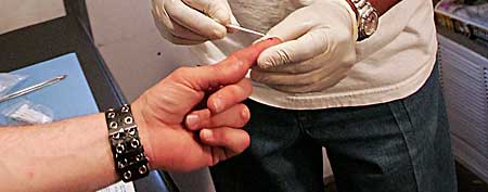 Nurse administers HIV test (Scott Olson/Getty Images)