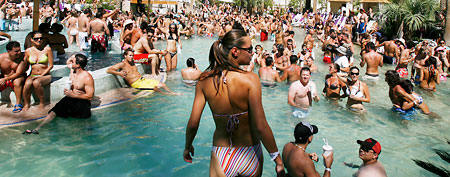 The icky hazards of public pools. In this photo: Bodies pack the pool during the Sunday afternoon pool party at the Hard Rock Casino & Hotel in Las Vegas (AP)