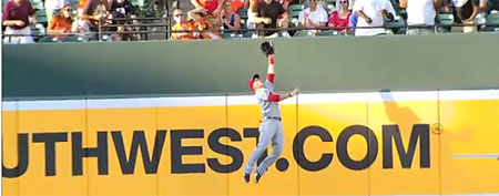 Angels outfielder Mike Trout wows the crowd with his home run-saving catch. (Screen Grab Courtesy of Yahoo! Sports Blogs)