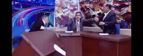 A Jordanian politician pulls a gun on live television. (YouTube)