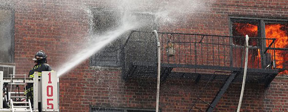 Firefighters battle a six-alarm fire in Brooklyn. (Spencer Platt/Getty Images)