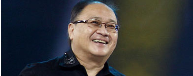Telco magnate Manny Pangilinan tells young Filipinos how they can be richer than many others. (NPPA Images)