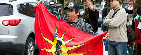Demonstrators rally against shale gas exploration in Halifax on Friday, Oct.18, 2013. The effort was in support of protesters, some of whom included members of the Elsipogtog First Nation, who rallied against SWN Resources and its possible plans to proceed with shale gas development in eastern New Brunswick. THE CANADIAN PRESS/Andrew Vaughan