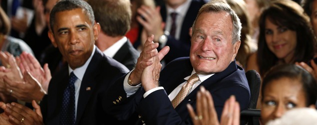 George H.W. Bushapplauds at the White House (Kevin LaMarque/Reuters)