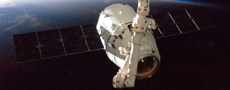 The SpaceX Dragon commercial cargo craft is grappled by the International Space Station's Canadarm2 robotic arm on Oct. 10, 2012, during the spacecraft's first cargo delivery mission for NASA under a $1.6 billion deal for commercial cargo deliveries. (Space.com)