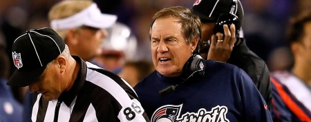 New England coach Bill Belichick crosses the line with a post-game move. (Getty Images)