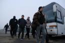 Ukraine rivals begin prisoner exchange in controversial swap