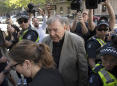 The Latest: Vatican investigates Pell after conviction