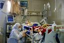 Iran virus deaths now 77 as emergency services chief infected