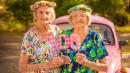 Twin Sisters Celebrate Turning 100 With Flower-Filled Photo Shoot