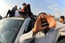 Iraqi protesters rally after night of arson attacks