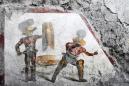 Vivid gladiator fresco discovered at Pompeii