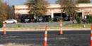 Worker found dead at Concord tire store, man charged with murder after standoff