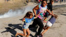 Activists, Politicians React With Horror At Border Scenes Of Tear-Gassed Children