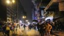 Hong Kong riot police use tear gas to answer firebombs to ring in New Year