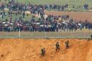 Clashes as thousands of Gazans march near Israel border