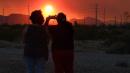 In pictures: Huge Nevada wildfire turns Las Vegas sky red